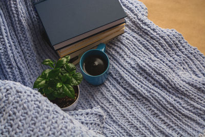 High angle view of coffee cup on table