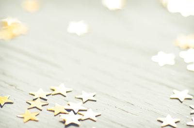 High angle view of star shape decorations on table