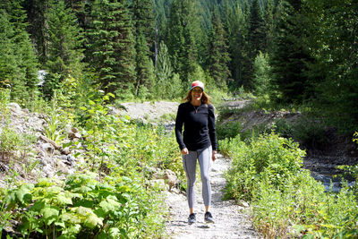 Man standing in forest