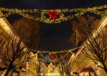 Low angle view of illuminated chandelier