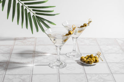 Fruits in glass on table