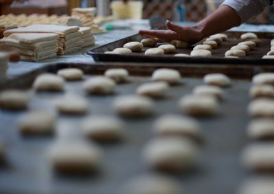 Cropped image of person preparing food