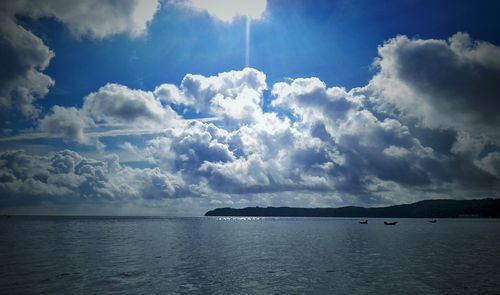 Scenic view of seascape against cloudy sky