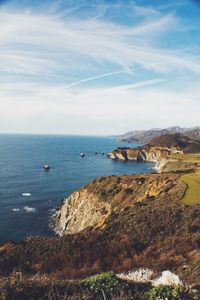 Scenic view of bay against sky