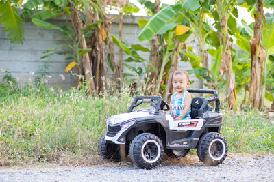 Portrait of boy in car