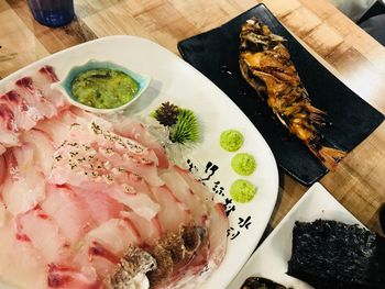 Close-up of sushi served on table