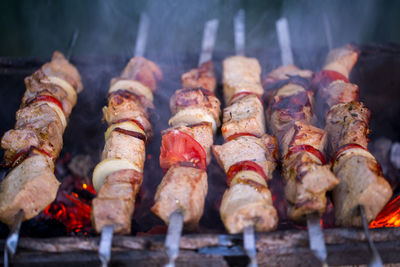 Close-up of meat grilling on barbecue