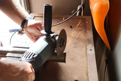 High angle view of man working on table