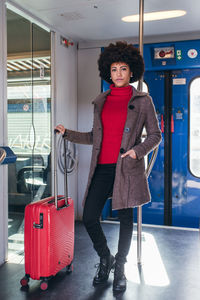 Elegant woman going for business trip on train