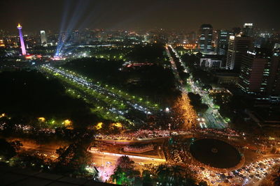 High angle view of illuminated cityscape at night