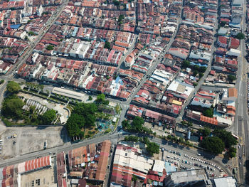 High angle view of road amidst buildings in city