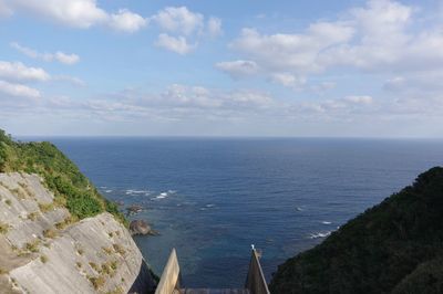 High angle view of sea shore against sky