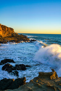 Scenic view of sea against clear sky