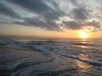 Scenic view of sea against sky during sunset