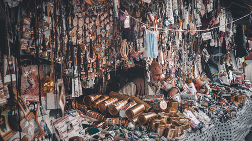 Group of people for sale at market stall