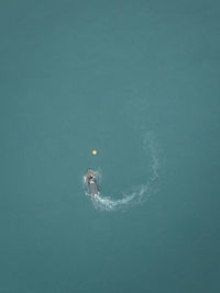  aerial photograph of a boat in motion