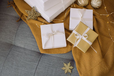 High angle view of paper in box on table