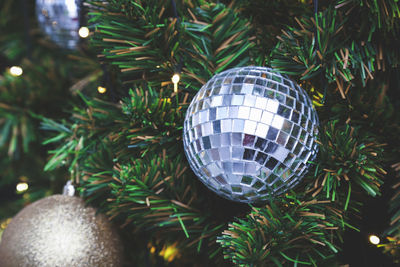 Close-up of christmas decoration on table at home