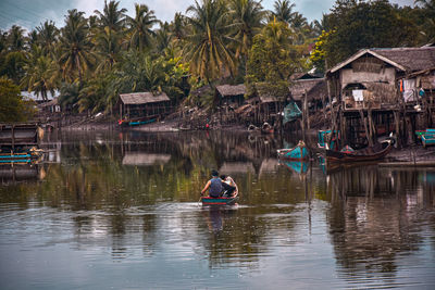 People on boat in lake