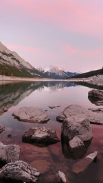 Scenic view of lake at sunset