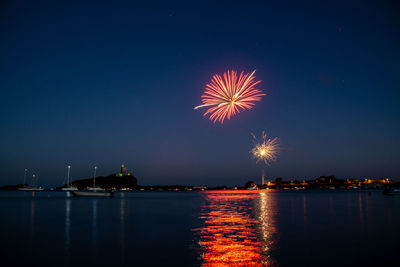 Firework display over nora bay, sardinia