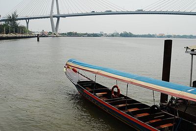 View of bridge over river in city