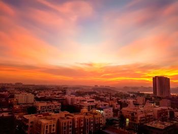 High angle view of townscape against sky during sunset