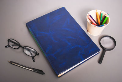 Close-up of school supplies on table