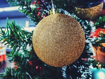 Close-up of christmas decoration hanging on tree