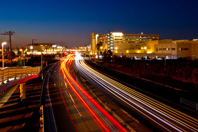 High angle view of light trails on road at night