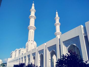 Low angle view of building against blue sky