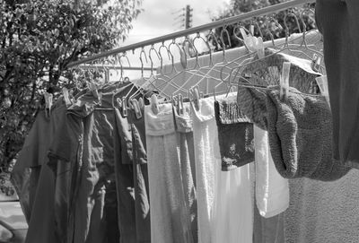 Close-up of clothes drying on railing