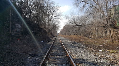 Railroad track against sky