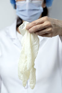 Close-up of man holding white background