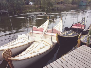 Boats moored at harbor