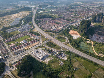 High angle view of road amidst buildings in city