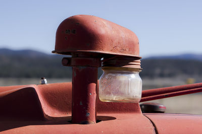 Cropped image of tractor against sky