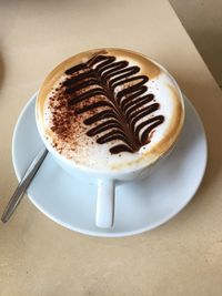 High angle view of coffee on table