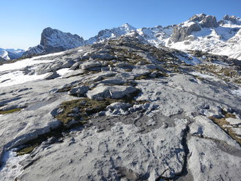 Scenic view of snowcapped mountains against clear sky