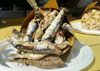 High angle view of fish in plate on table