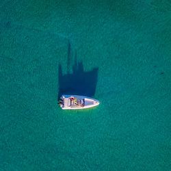 High angle view of ship sailing in sea