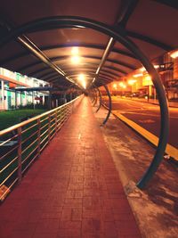 Illuminated railroad station at night