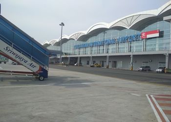 Vehicles on road against sky