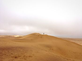 Scenic view of desert against sky