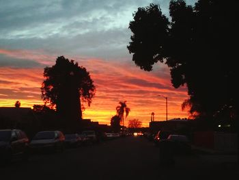 Road against cloudy sky at sunset