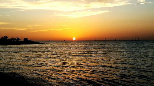 Scenic view of sea at sunset