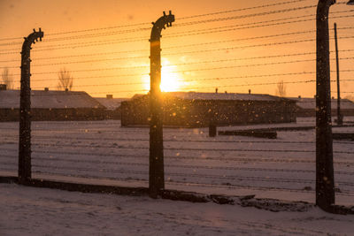 Scenic view of snow during sunset