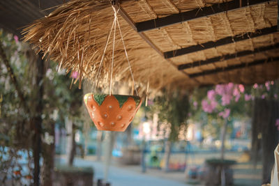 Close-up of decoration hanging on roof