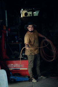Portrait of worker in workshop