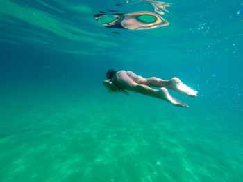 Man swimming in sea